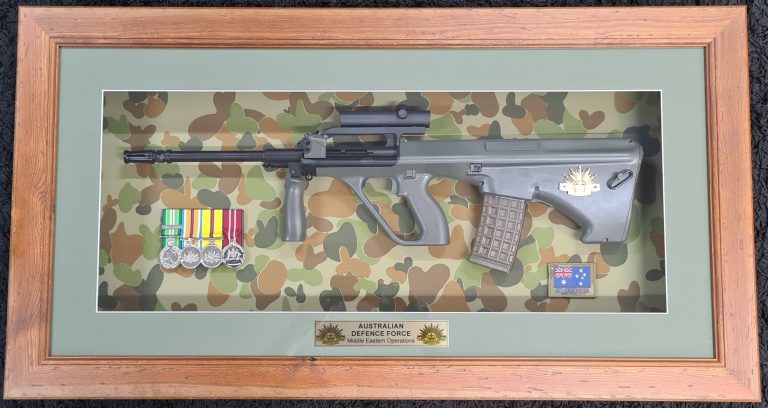 Framed 2000’s Australian Army ADF framed F88 Steyr rifle & medals Desert