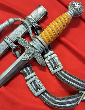 WW2 Germany Luftwaffe officer’s 2nd pattern dagger and scabbard with hangers by Alcoso Solingen.