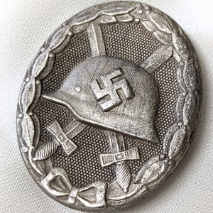 WW2 GERMAN WOUND BADGE IN SILVER #107 BY CARL WILD OF HAMBURG
